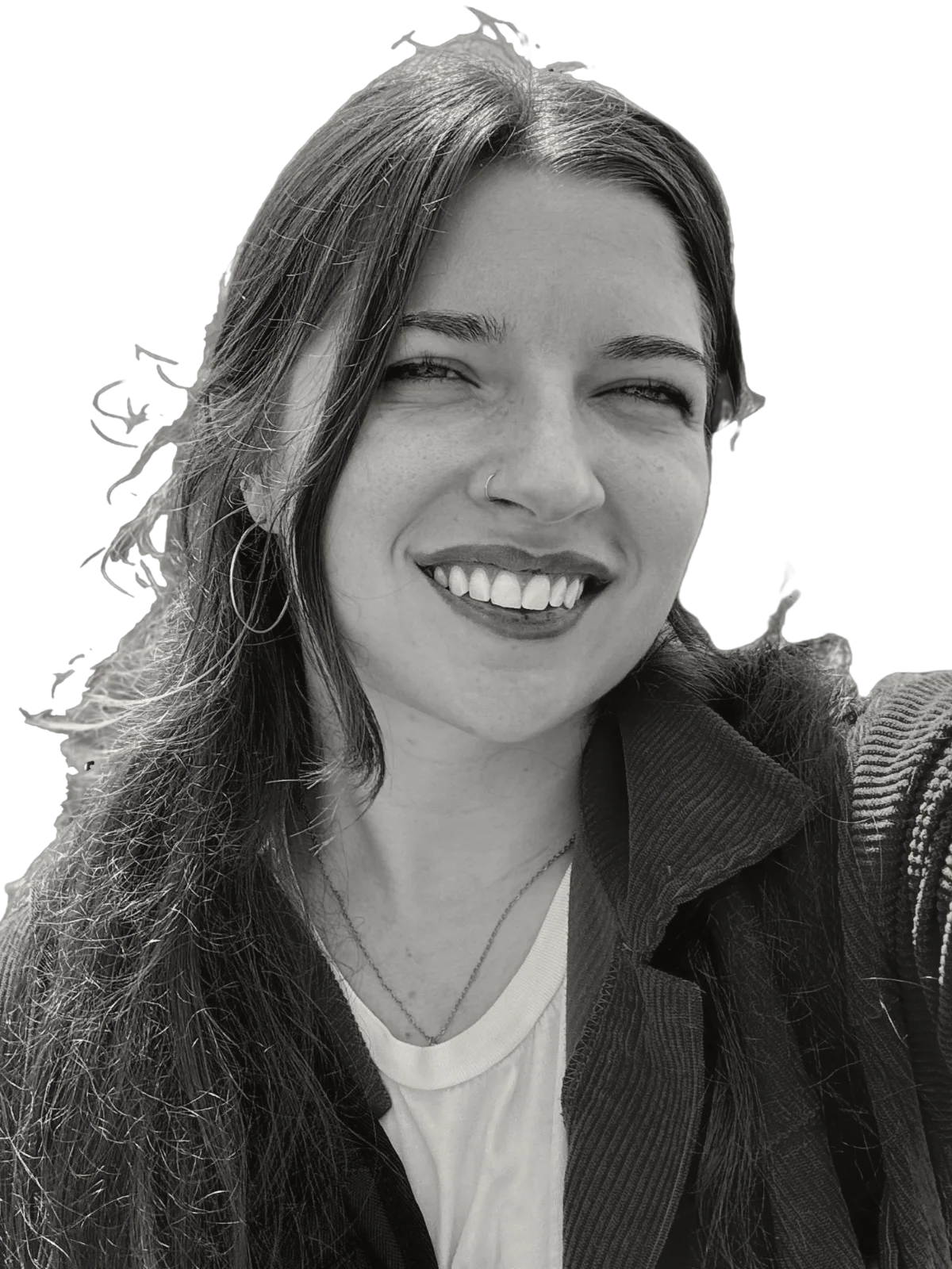 Abby LeMaster, smiling, in a black-and-white portrait